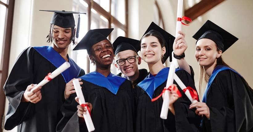 Group Of Graduates In Ceremony Suits Celebrating With Diplomas At Phoenix Graduation From Van Allan&Amp;Apos;S Mens Fashion