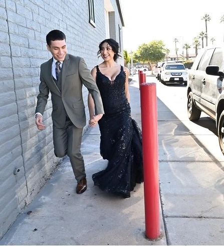 Young Man In Sage Green Prom Suit With Date In Black Formal Dress At Outdoor Phoenix Prom Event
