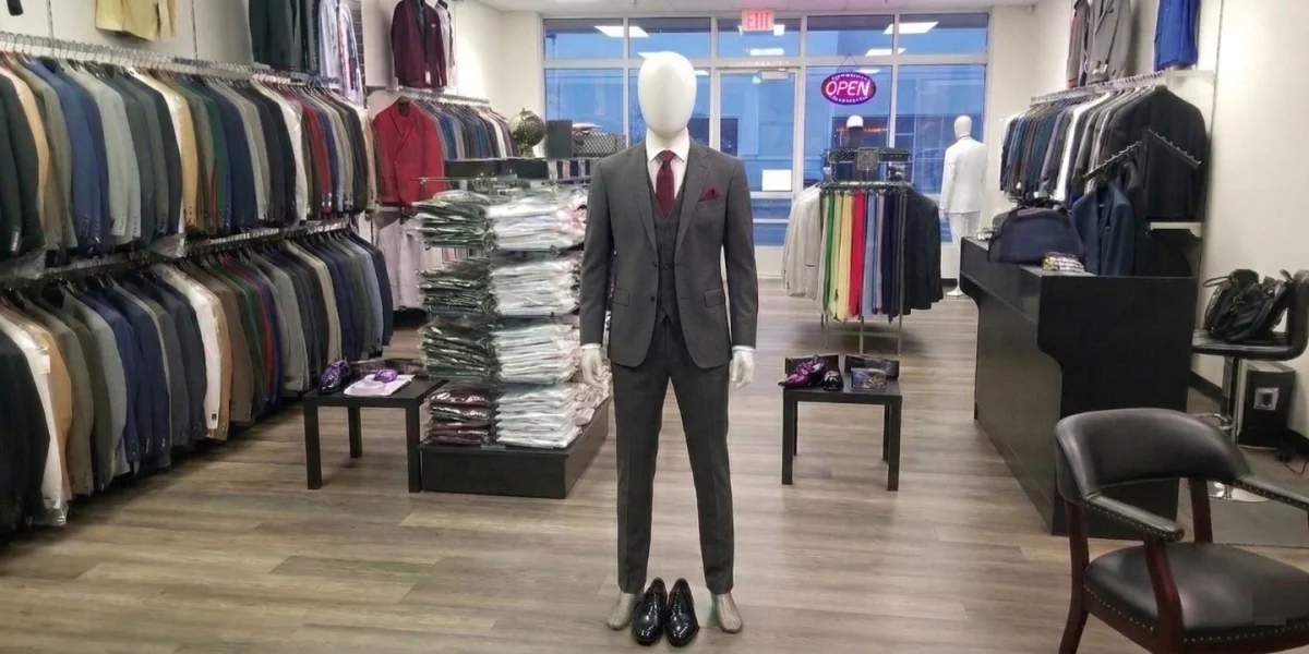 wedding suits Phoenix charcoal suit with red tie on mannequin in store at Van Allan's Mens Fashion
